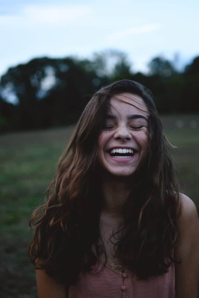 girl smiling happily